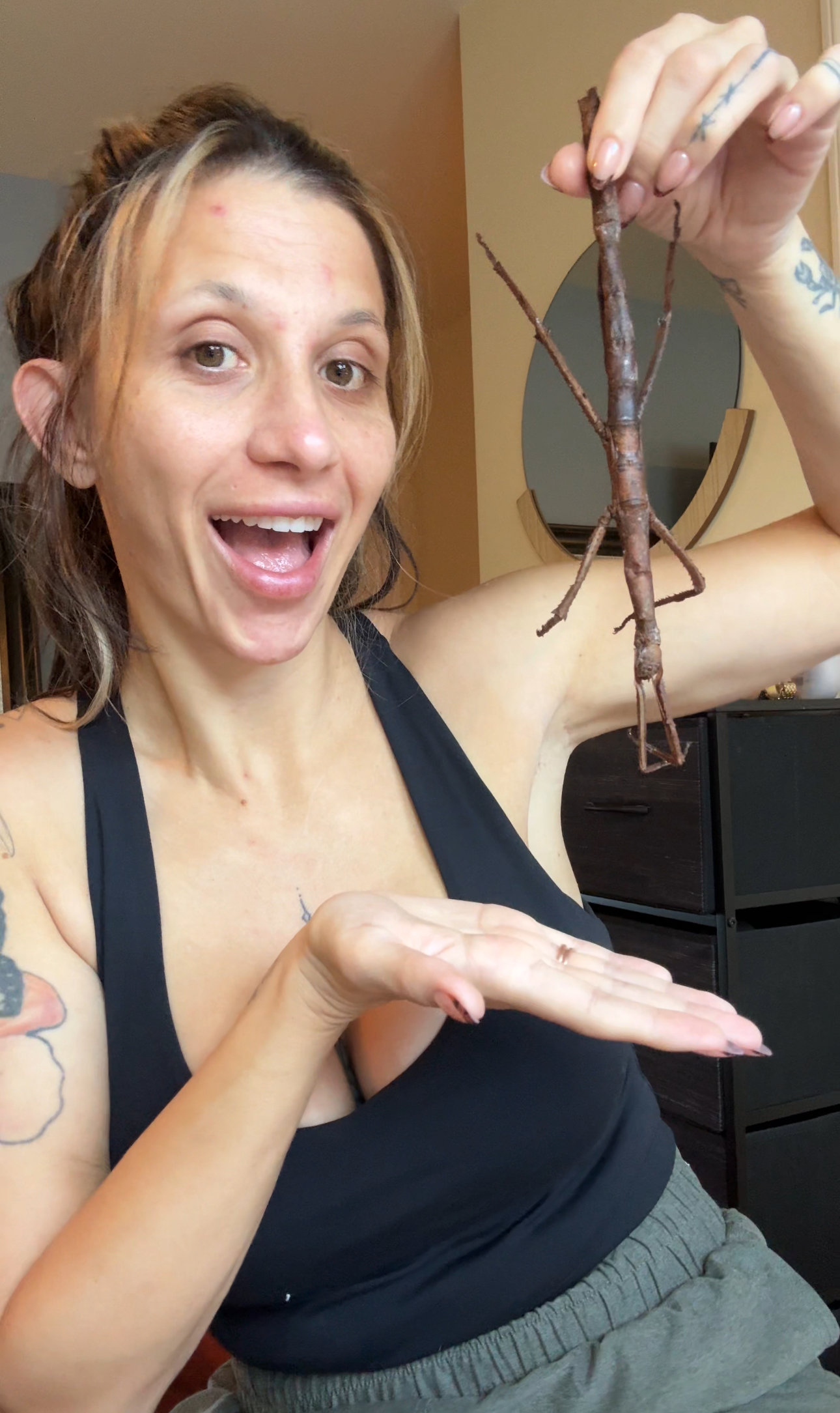 Rae holding a giant stick insect